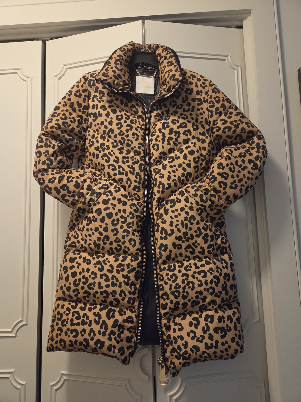 Leopard Print Puffer Jacket in Tan and Black .